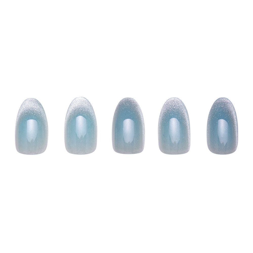 Five short oval nails in a glossy, gradient teal are neatly arranged on a white background—glamnetic’s Unicorn Tears press-on set brings the elegance of velvet metallic nails to your fingertips. - Product image