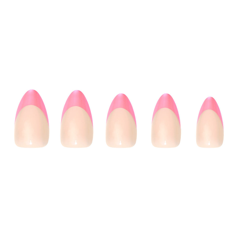 Five almond-shaped glamnetic Bubble Gum Glaze nails, featuring a nude base with bright pink French tips, are arranged in a row against a white background. - Product image