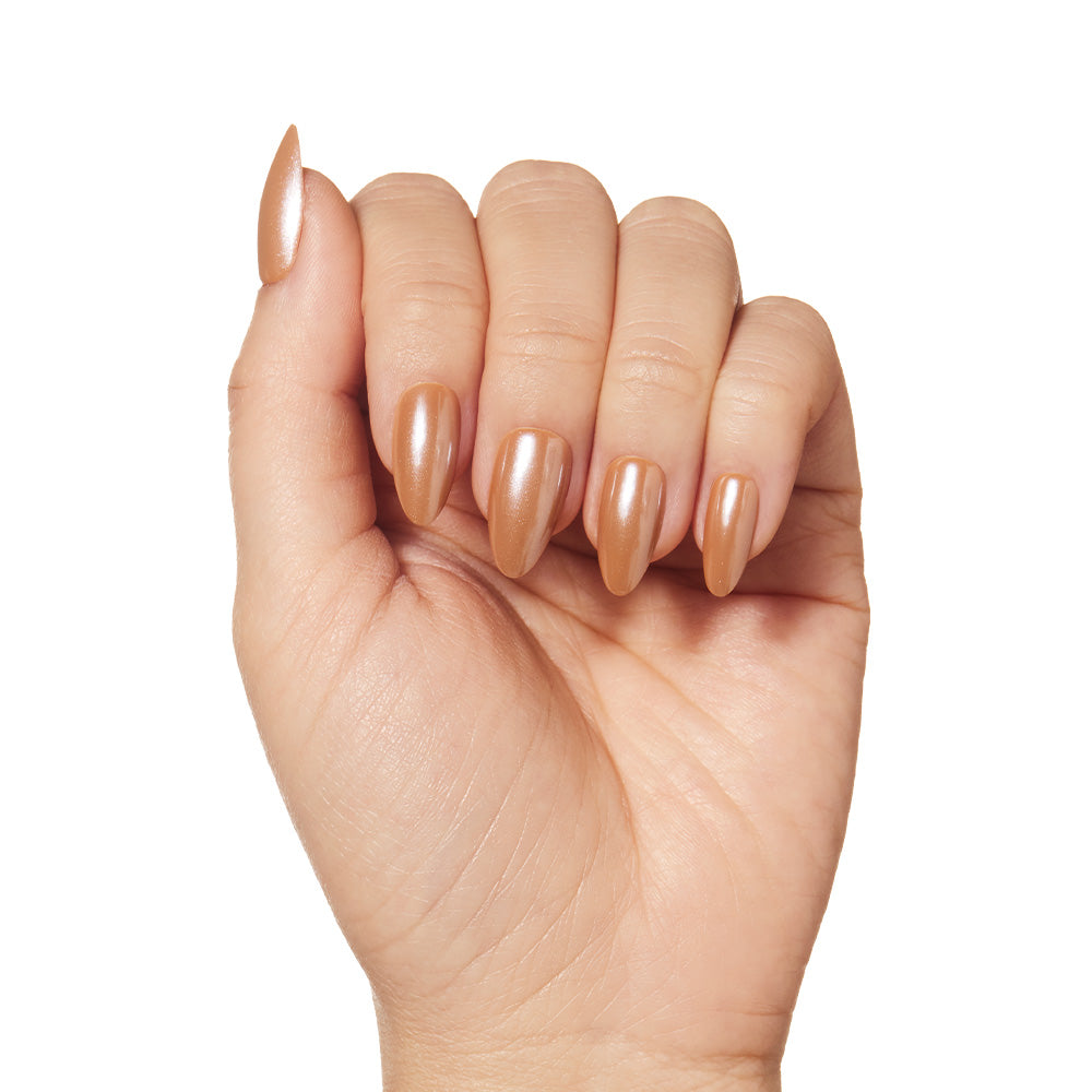 A hand with fingers curled inward displays short, almond-shaped nails painted in glamnetic’s Maple Glaze, a metallic nude-taupe shade, against a white background. - Product image