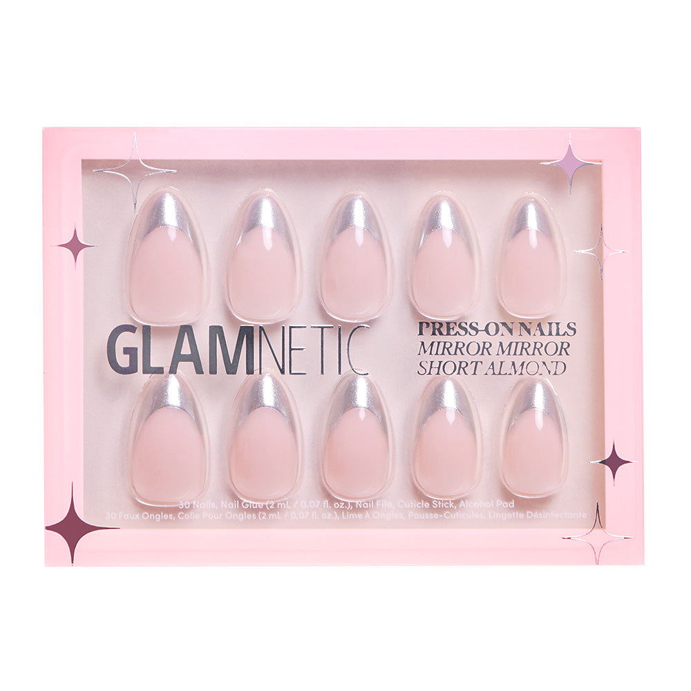 A pink box from glamnetic contains ten Mirror Mirror short almond press-on nails with a glossy, light pink mirror finish and chrome silver french tips. GLAMNETIC and MIRROR MIRROR SHORT ALMOND appear on the front. - Product image