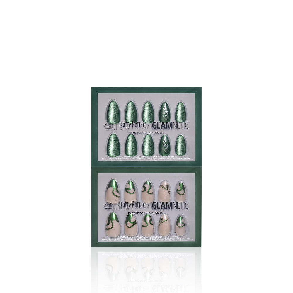 Two sets of glamnetic Team Slytherin™ almond nails are shown in rectangular packaging: shimmering emerald green on top and nude nails with green snake patterns below. Vegan and cruelty free. - Product image