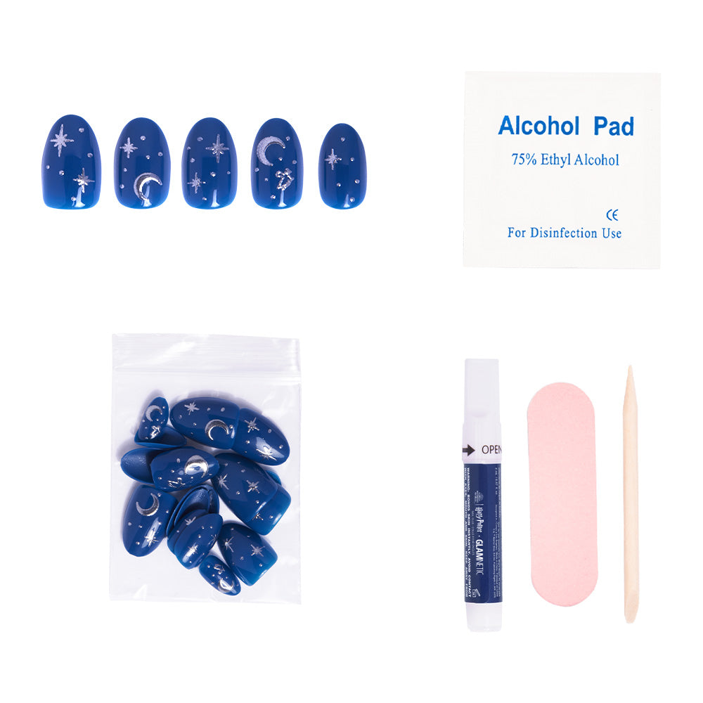 The glamnetic Luna Lovegood™ set features blue short oval nails with white celestial designs and silver foil accents, plus an alcohol pad, file, cuticle stick, adhesive, and extra nails—all displayed on a white background. - Product image