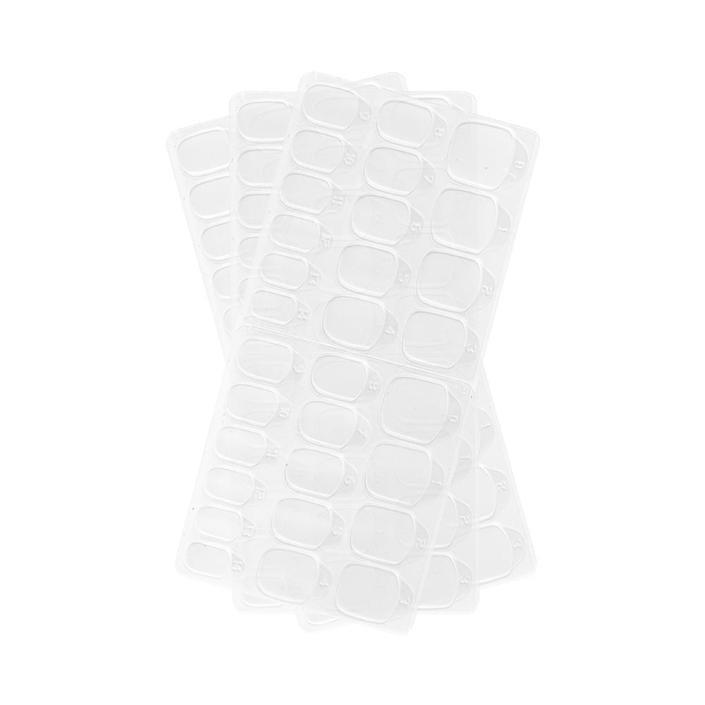 Four clear plastic ice cube trays, each with rectangular compartments, are stacked on a white background—perfect for organizing small items like glamnetic Harry Potter™ Adhesive Nail Tabs. - Product image