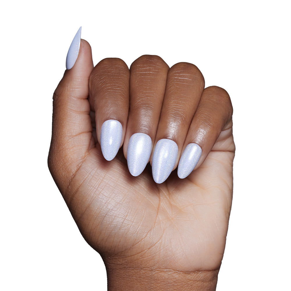 A hand with medium brown skin shows short, almond-shaped nails painted in glamnetics Frozen—a shimmery, pale lavender—against a white background. - Product image