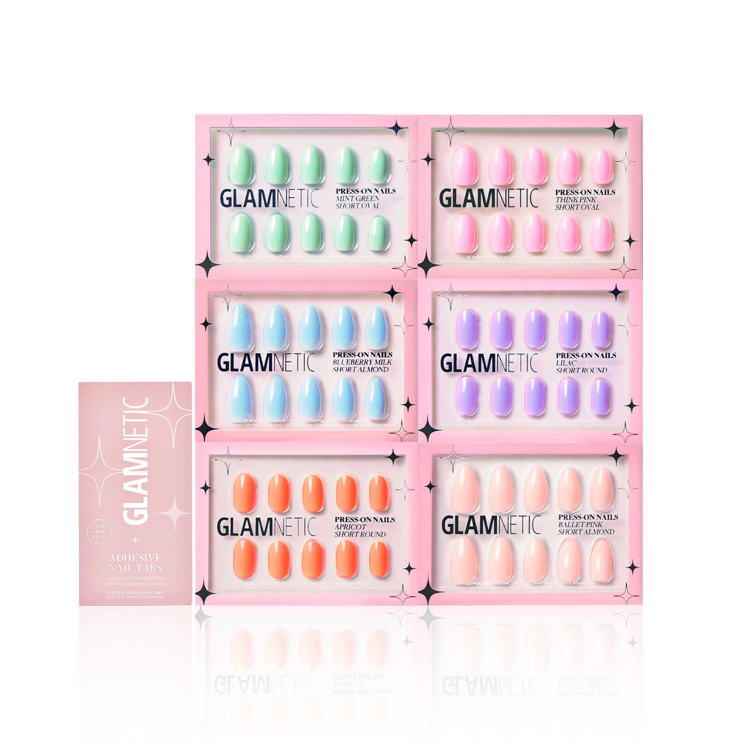 Six sets from the glamnetic The Solids: Spring Bloom Collection, in pastel and bright shades like Mint Green and Ballet Pink, are displayed in a grid with a pink glamnetic box. Each set contains twelve nails in a clear case. - Product image