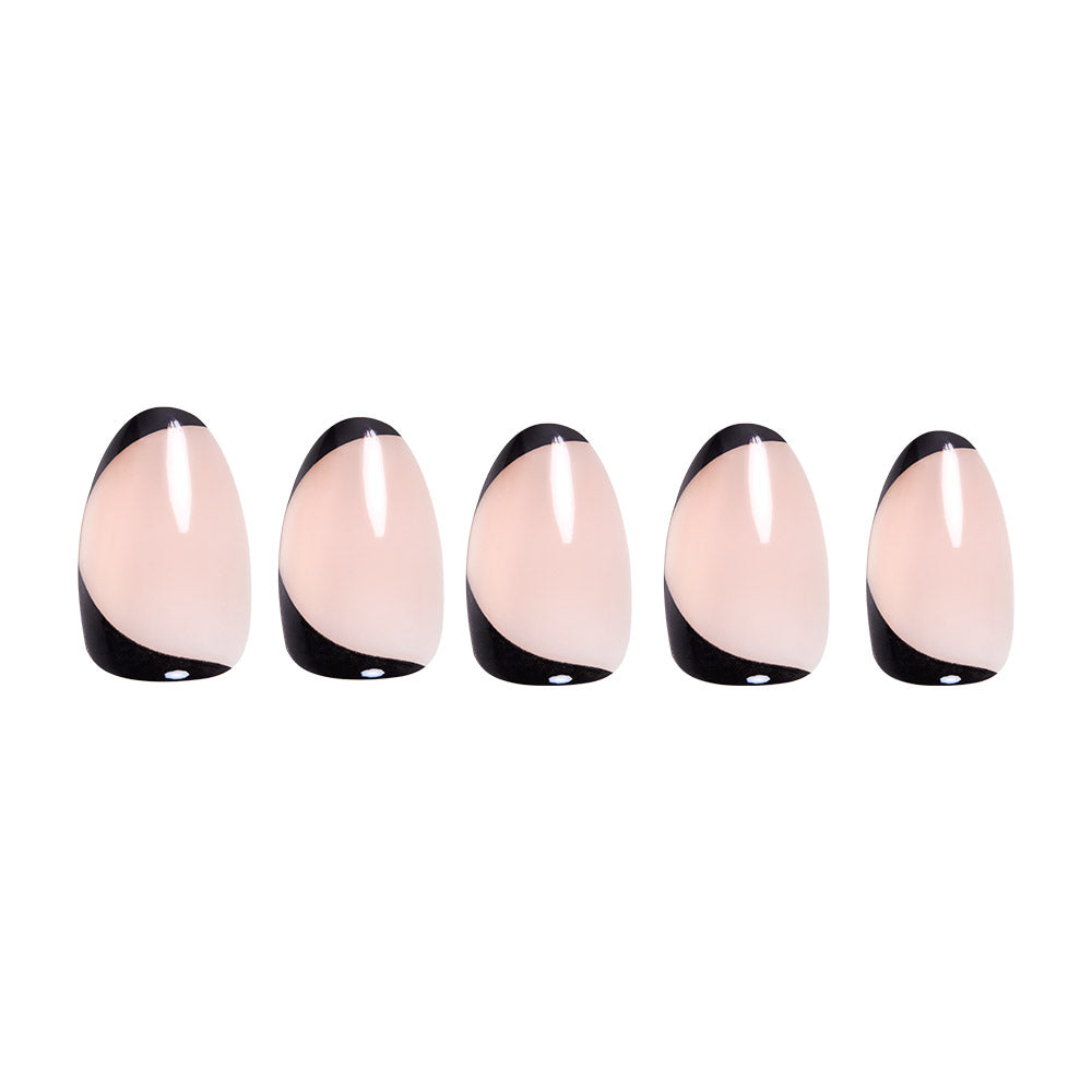 Five reusable glamnetic NYC press-on nails with a nude base and black abstract tips are arranged in a row on a white background. - Product image