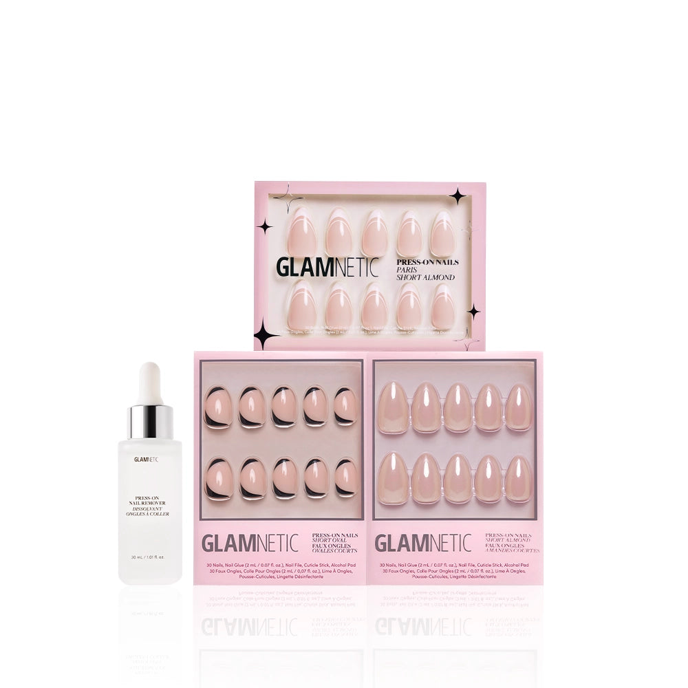 The Glam and the City set by glamnetic features a nail serum with dropper plus three boxes of salon-quality nude press-ons, all elegantly displayed against a white background for the perfect manicure bundle. - Product image