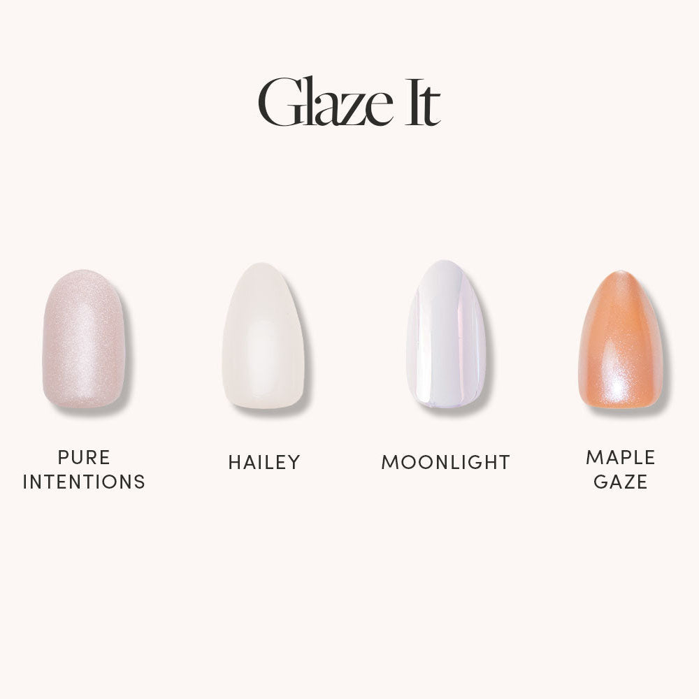 Four Glaze It press-on nails by glamnetic are shown in polished shades: sheer pink (Pure Intentions), creamy white (Hailey), shimmery white (Moonlight), and metallic copper (Maple Glaze) beneath the text Glaze It. - Product image