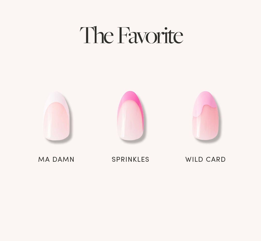 The Favorite by glamnetic features three vibrant artificial nails—MA DAMN, SPRINKLES, and WILD CARD—with unique pink designs, including a white French tip and artsy accents, all displayed on a light background. - Product image