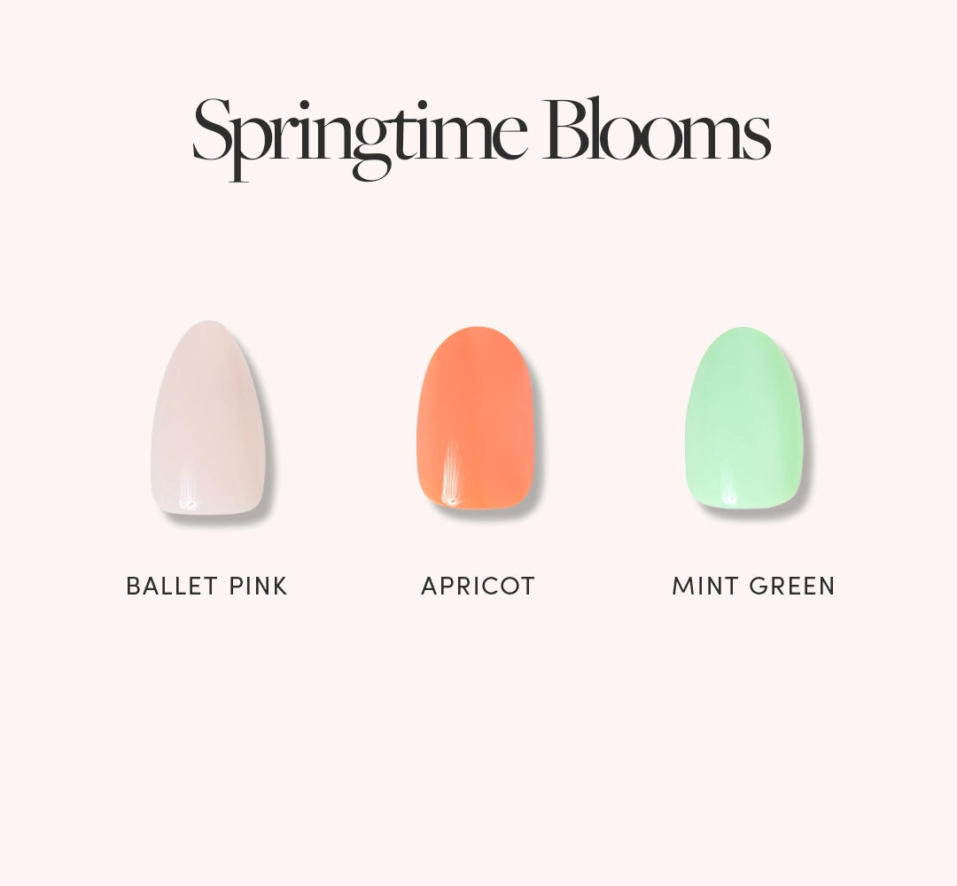 Under the heading “Springtime Blooms” by glamnetic, three nail polish swatches—Ballet Pink, Apricot, and Mint Green—are shown against a light background. - Product image