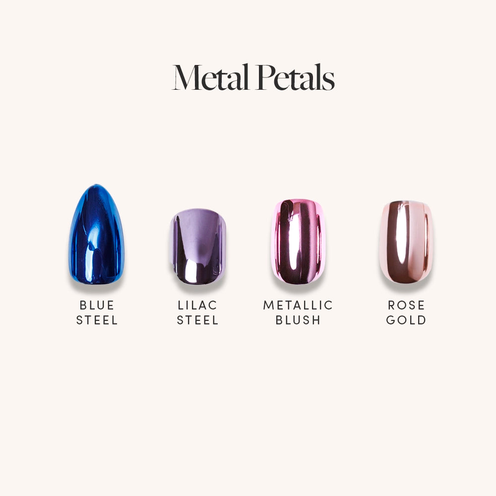 Four glamnetic Metal Petals artificial nails in high-shine blue steel, lilac steel, metallic blush (pink), and rose gold are displayed side by side on a light background under the title Metal Petals. - Product image