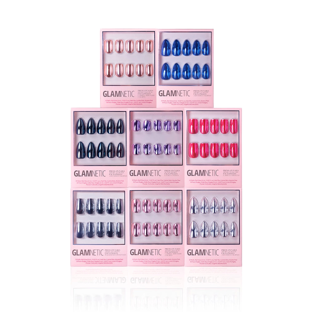 Eight boxes of glamnetic’s Summer Steel Collection press-on nails in pink, blue, silver, purple, and red are arranged in two rows against a white background—perfect for a bold chrome luxury manicure. - Product image