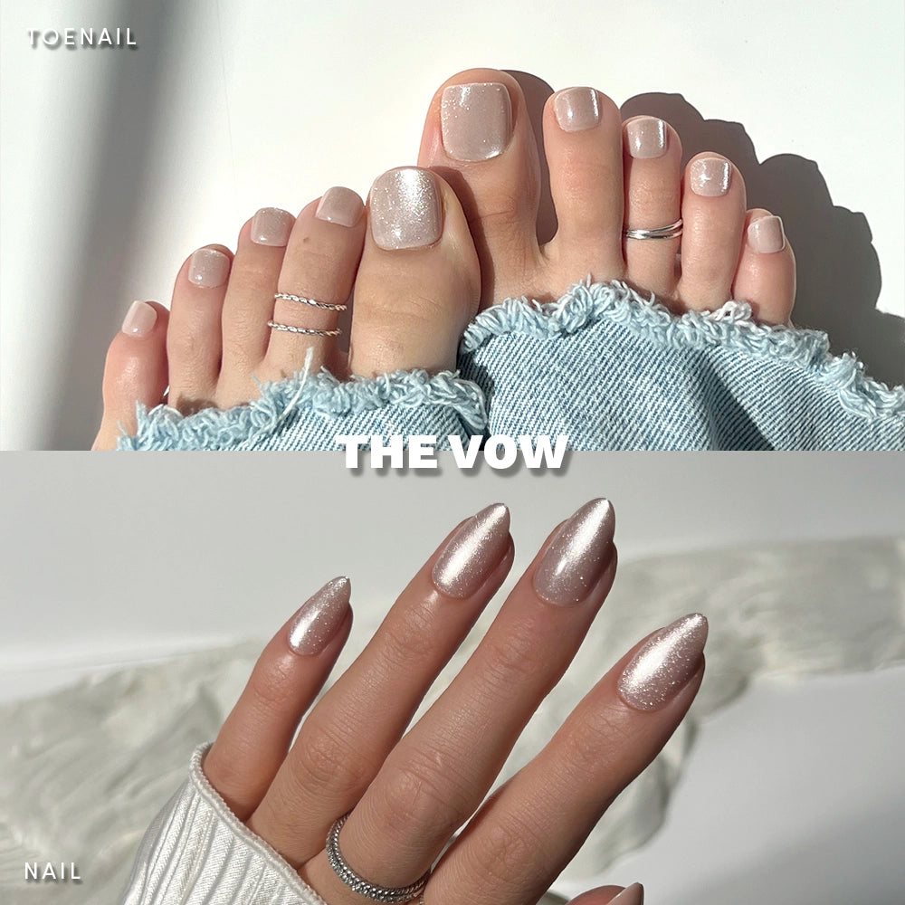 Glamnetic The Vow Mani & Pedi set worn on real hands and feet. Features a soft champagne-pink shimmer finish with square-shaped toenails and almond-shaped fingernails, styled with silver rings and cozy denim. - Product image