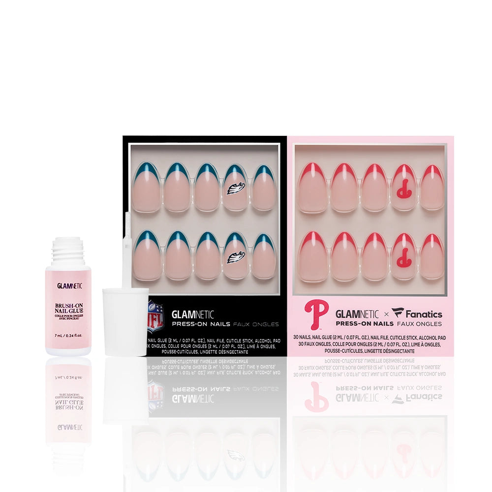 Three boxes of glamnetic press-on nails, including the Philadelphia All-Stars fan set, are shown with a pink nail glue bottle. Each set features a nude base and blue, red, or graphic accents. - Product image