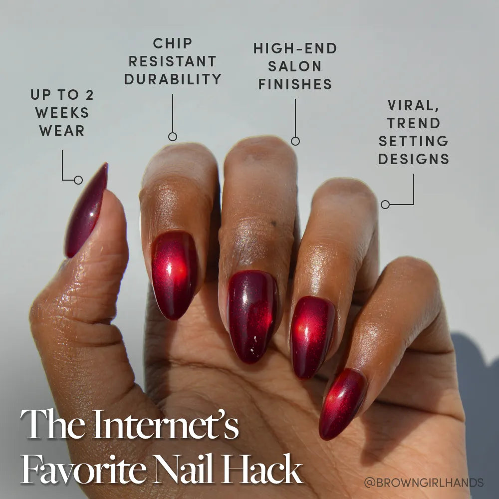 A hand with long, shiny, dark red nails is shown. Labels highlight up to 2 weeks wear, chip-resistant durability, high-end salon finish, and viral designs. Text reads: glamnetic Frosted Cranberry—The Internet’s Favorite Nail Set. - Product image