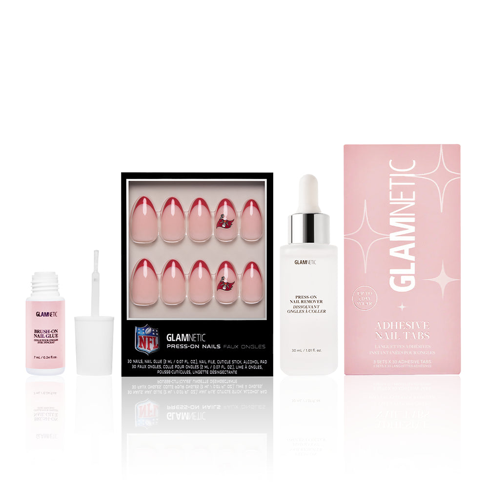 The Tampa Bay Buccaneers Press-On Playbook by glamnetic includes NFL-branded press-on nails, adhesive nail tabs, a brush-on nail glue, and remover—everything needed for salon-quality nails. - Product image