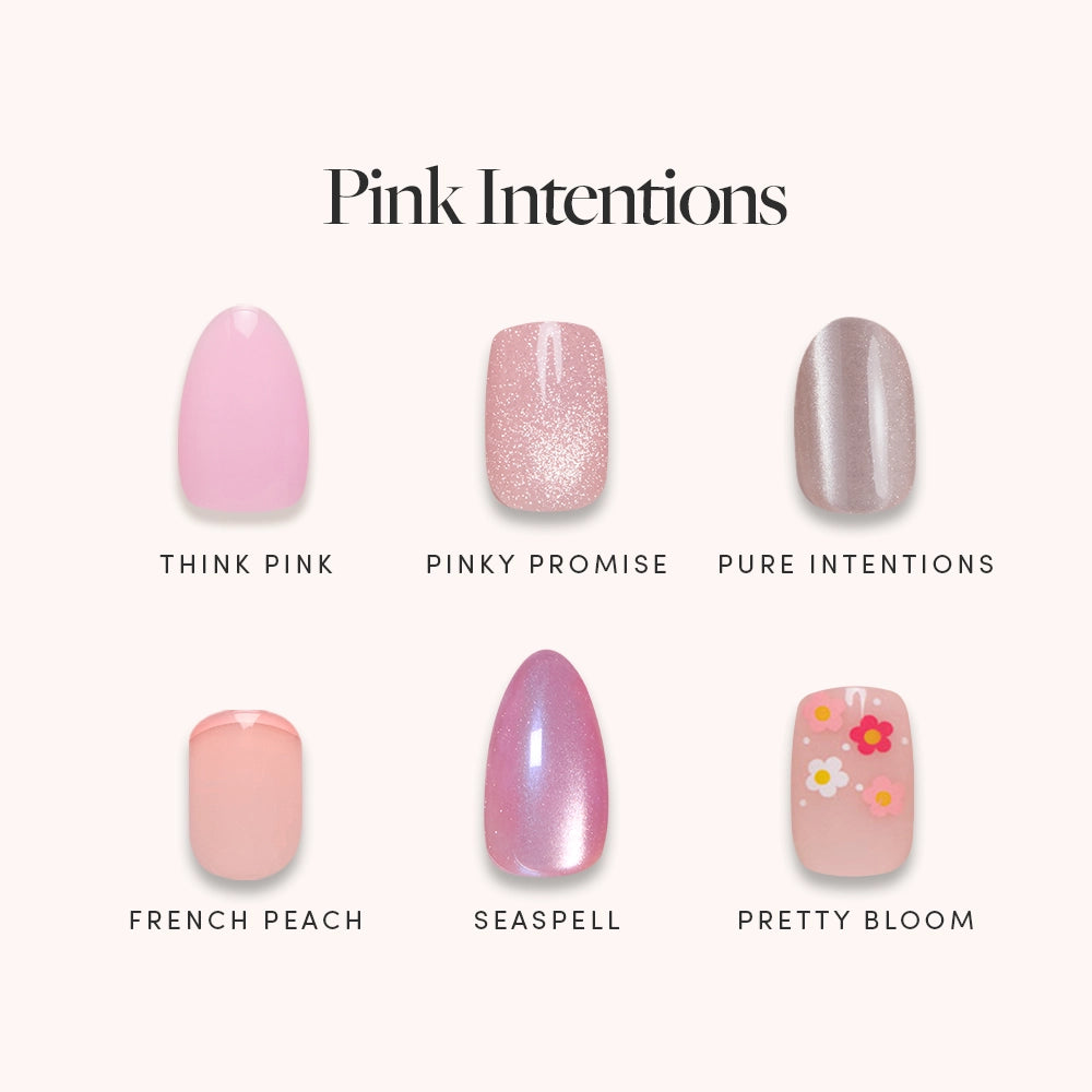 Six salon-quality Pink Intentions press-on nails by glamnetic are displayed in two rows, featuring solid pink, glitter pink, shimmery taupe, peach, iridescent pink, and floral designs. Each nail style is labeled with its unique name.