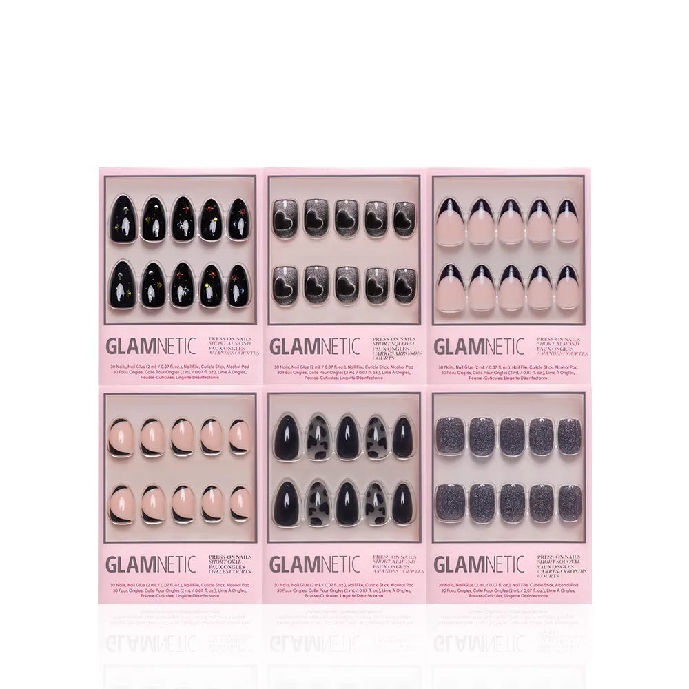 Six boxes of the glamnetic Countdown in the City Bundle are arranged in two rows on a white background. Each box features a unique pattern, including black and glittery nails—perfect for New Year's. - Product image