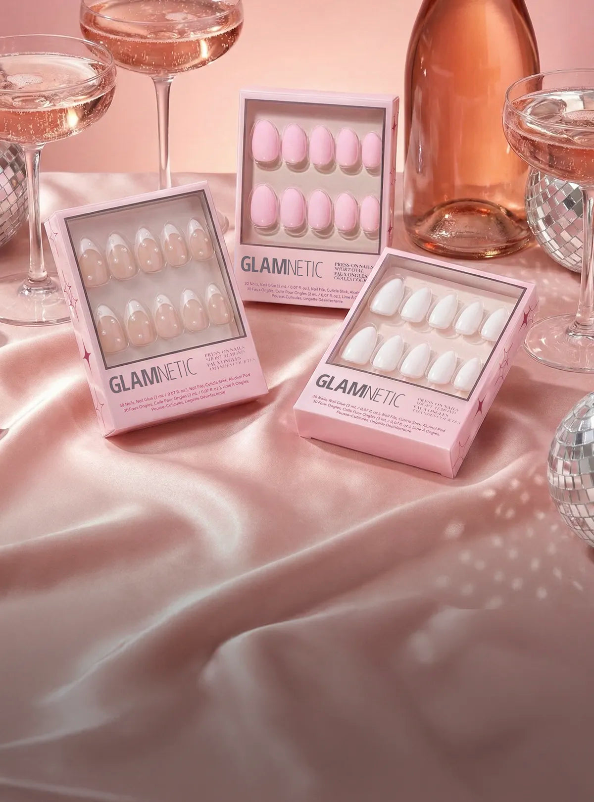 End of Year Sale widget banner featuring Glamnetic press-on nail sets with champagne glasses and disco balls, promoting 20% off almost everything and 25% off orders over $75 with code BYE2025