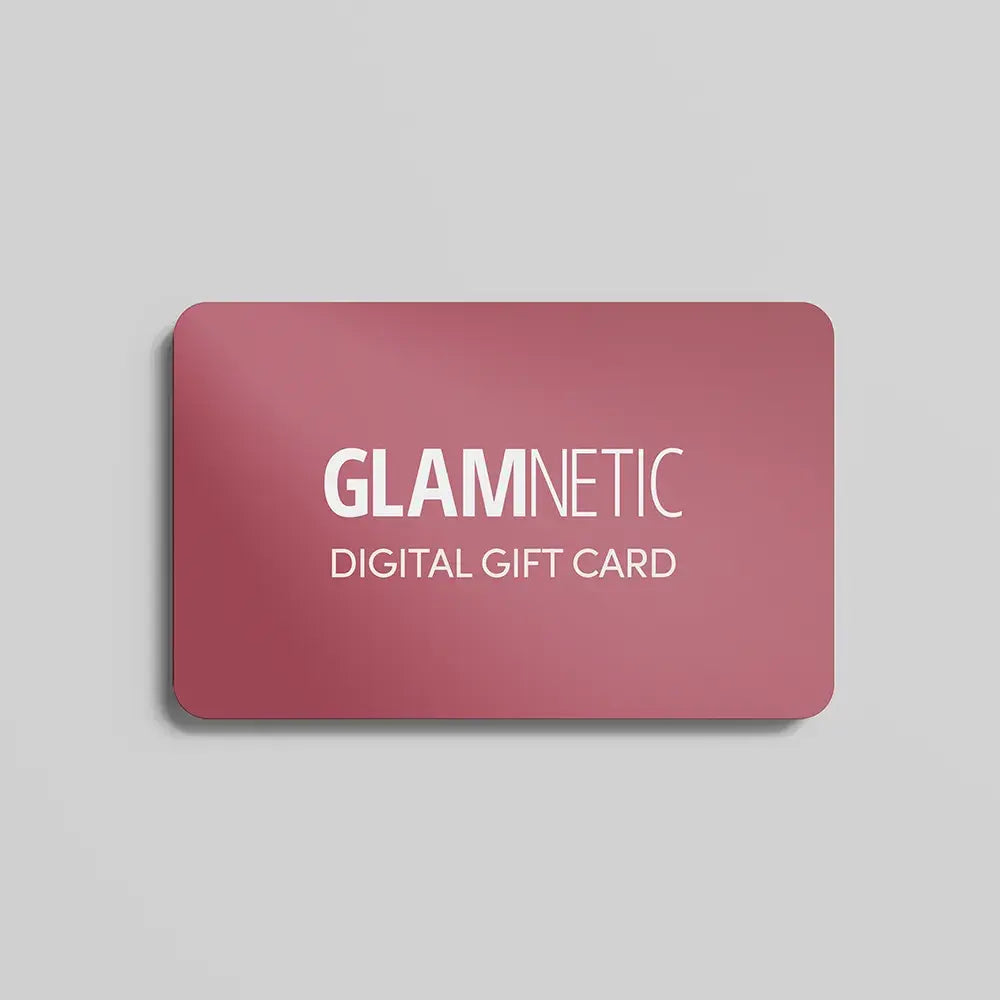 A pink rectangular card with rounded corners shows "glamnetic Gift Card" in bold white text—ideal for gifting magnetic lashes or press-on nails—set against a plain light gray background. - Product image