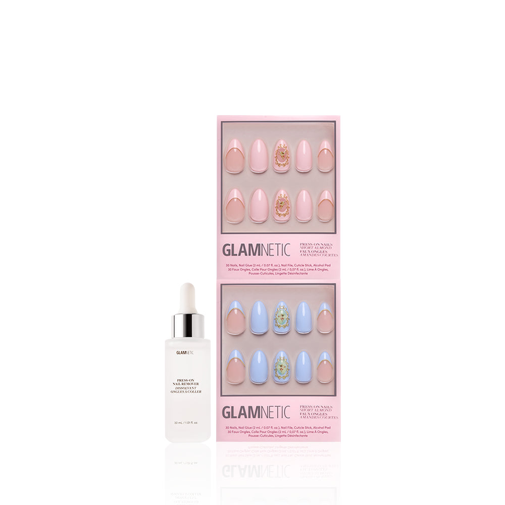 A bottle of nail glue and two sets of Glamnetic Heaven Sent almond press-on nails in a pink box, with pastel pink and blue cherub designs and 3D gold accents, shown on a white background. - Product image