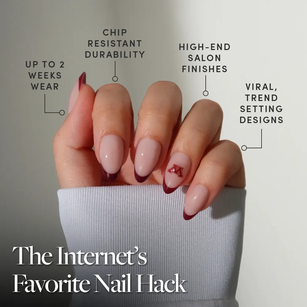 A hand with glamnetic’s Minnesota Golden Gophers Press-On Nail Set is held up, featuring chip-resistant durability and trendy burgundy-and-pink French tips—perfect for game day. Text reads: “The Internet’s Favorite Nail Hack.”. - Product image