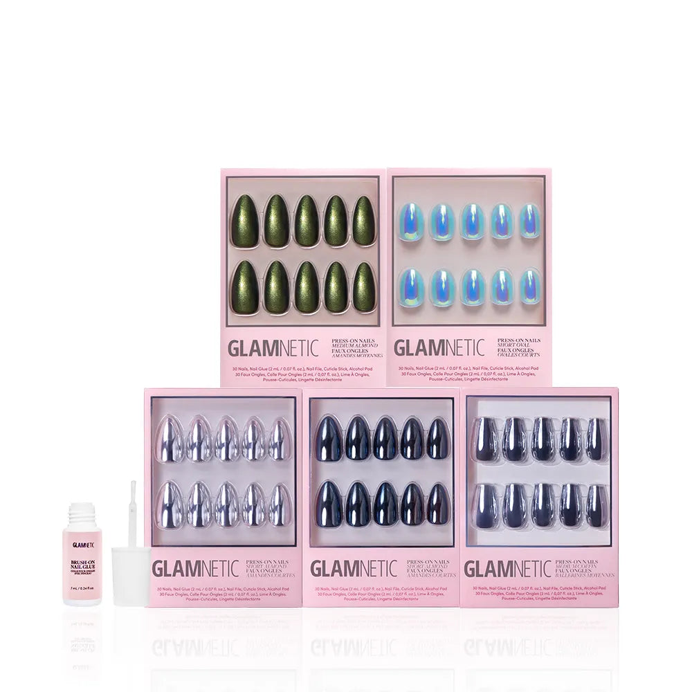 The After Party Bundle by glamnetic features five press-on nail sets—holographic and metallic chrome included—in signature pink packaging, with a nail glue bottle and applicator neatly placed to the left of the boxes. - Product image