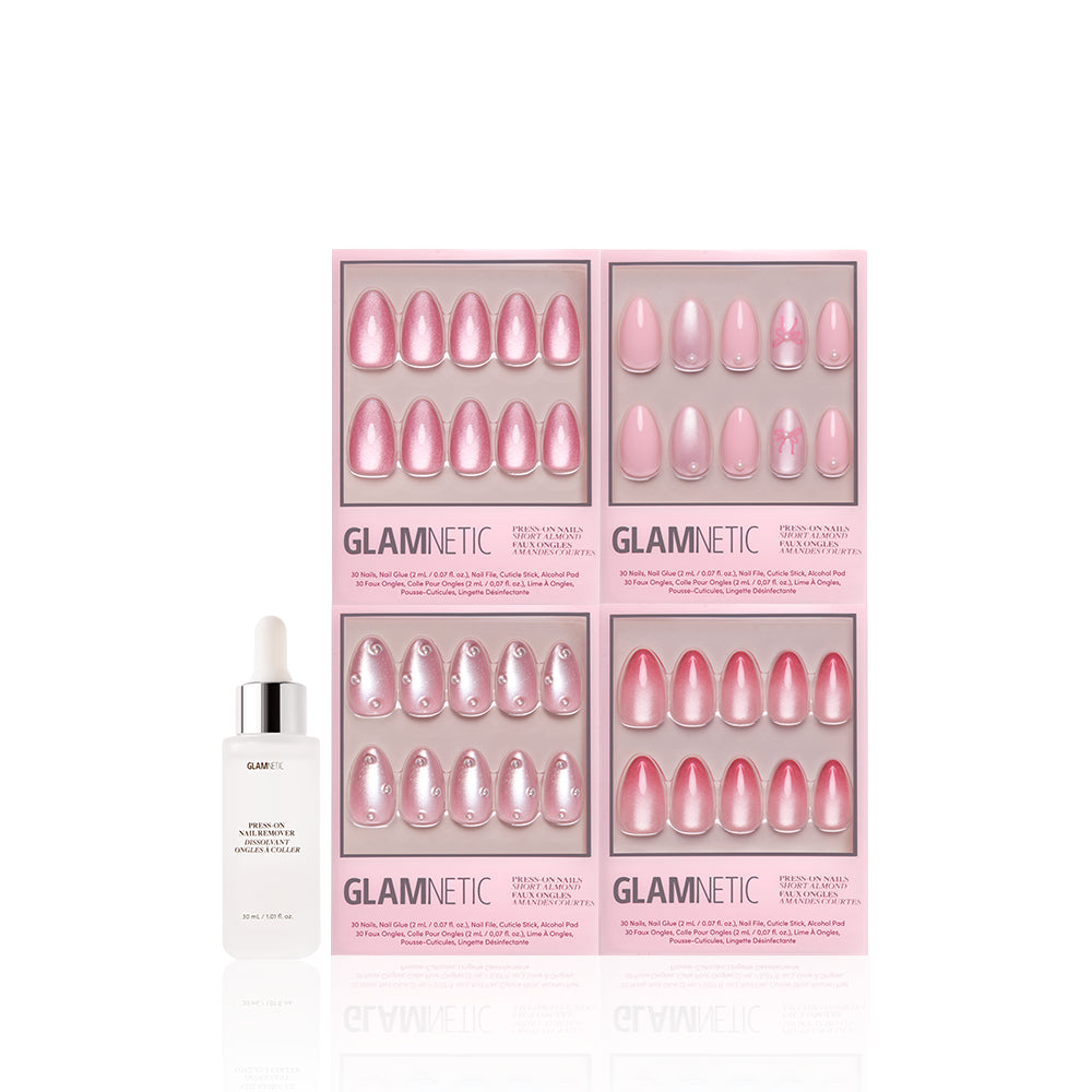 Four sets of Velvet Valentine blush nail designs by glamnetic, in glossy and glitter finishes, are displayed in pink packaging beside a white adhesive dropper bottle. The short almond set pops against the clean white background. - Product image