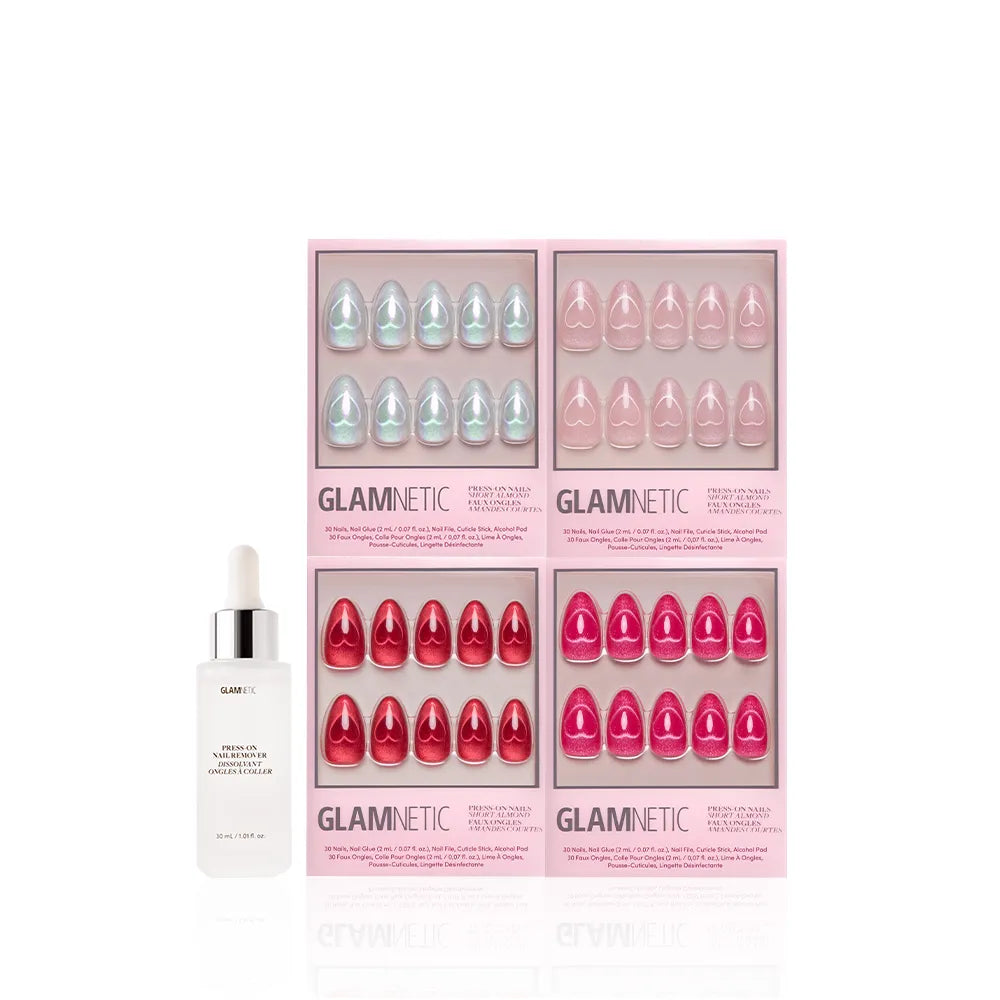 Glamnetic's Cupid's Magnetic Hearts almond nail sets in blue, light pink, pink, and red are shown in boxes next to a white dropper bottle of nail remover, all displayed against a white background. - Product image