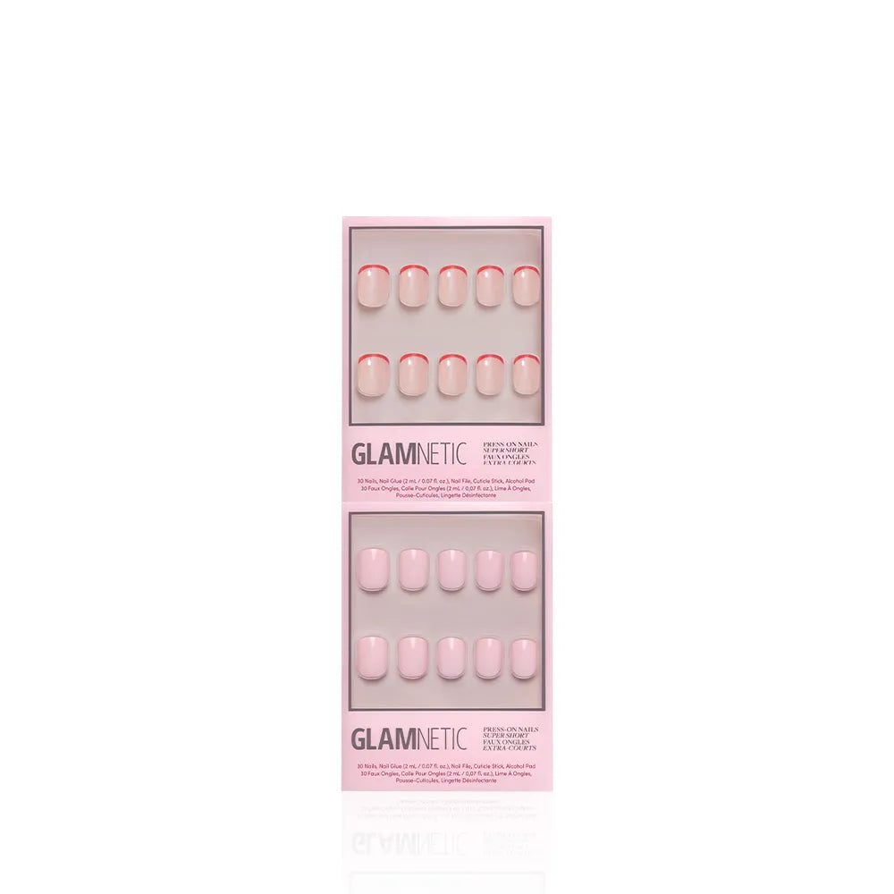 Two Glamnetic press-on nail sets, both in pink packaging: on top is the "Super Short & Sweet" set with solid light pink nails, and below is a pink set with red French tips—each neatly displayed in its box against a white background. - Product image