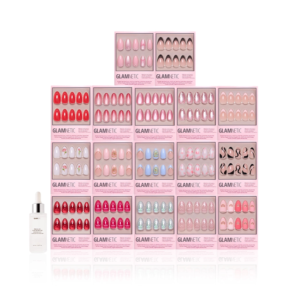 A pyramid display of 15 pink boxes of glamnetic's The Almond Crush press-on nails, featuring short almond designs in assorted colors, with a small white nail glue bottle placed in front. - Product image