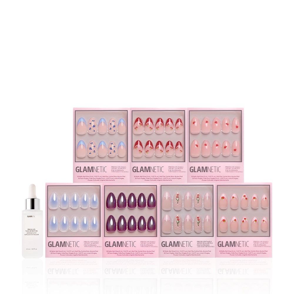 Seven sets of glamnetic Freshly Picked press-on nails in pink and purple French tip designs with a glossy finish, plus a nail glue dropper bottle, all displayed on a white background. - Product image