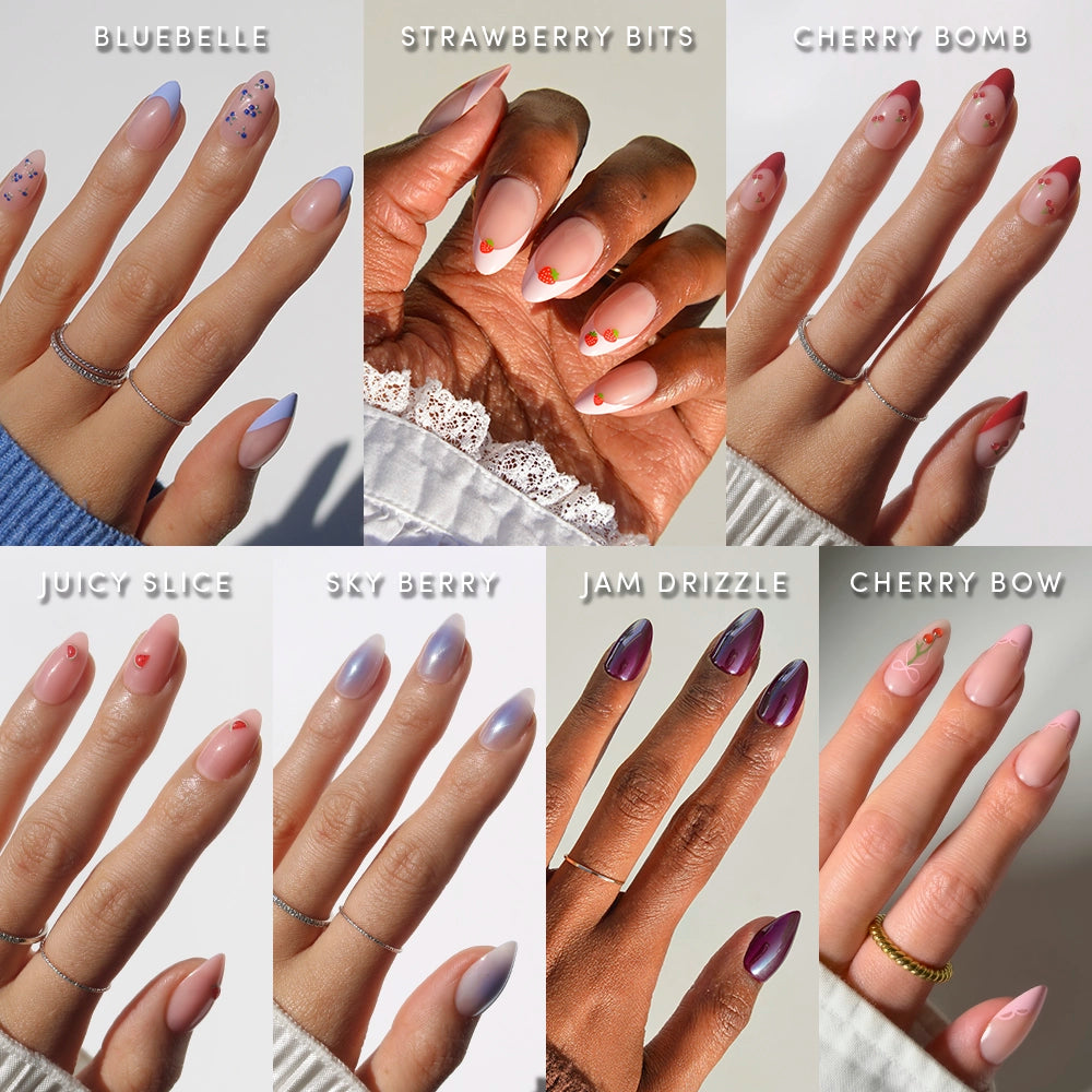 A collage of eight manicured hands shows off glamnetic’s Freshly Picked short almond nails, featuring various nail art styles—like Bluebelle and Cherry Bow—with French tips, fruity themes, and a glossy pastel finish. - Product image