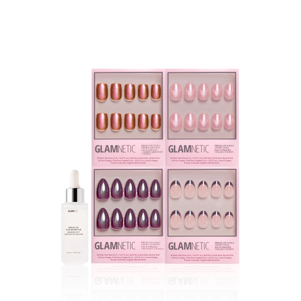 Four sets of Glamnetic Luscious Glaze press-on nails in pink boxes, each with chrome designs and various shades, are displayed above a white Glamnetic Cuticle Oil dropper bottle, all set on a white background. - Product image