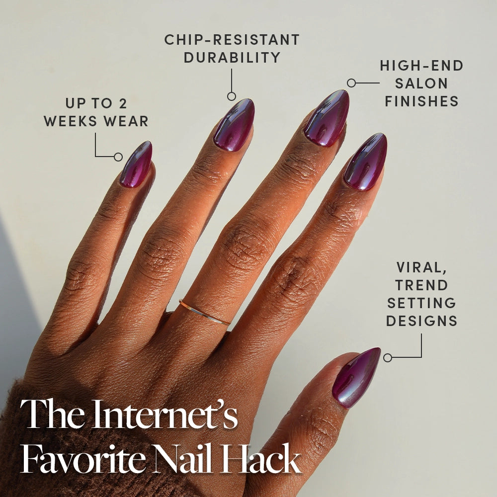 A hand with glossy purple almond-shaped nails in "Jam Drizzle" by glamnetic is shown. Text highlights: up to 2 weeks wear, chip-resistant durability, salon-quality finish, viral and trend-setting design. The Internet’s Favorite Press-On Nail Hack. - Product image