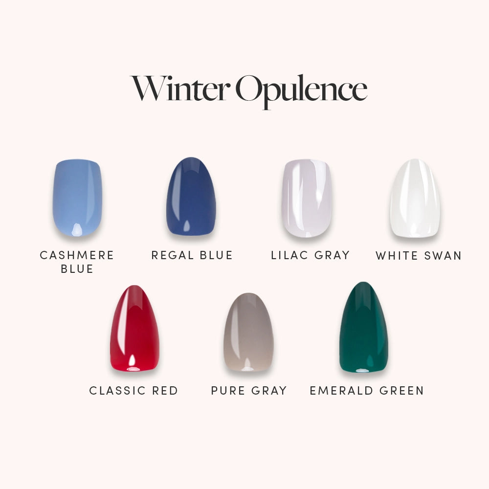 Six glamnetic nail polish shades—Cashmere Blue, Regal Blue, Lilac Gray, White Swan, Classic Red, Pure Gray, and Emerald Green—shine in the Winter Opulence collection. Ideal for at-home manicures or elevating your glamnetic nail set. - Product image