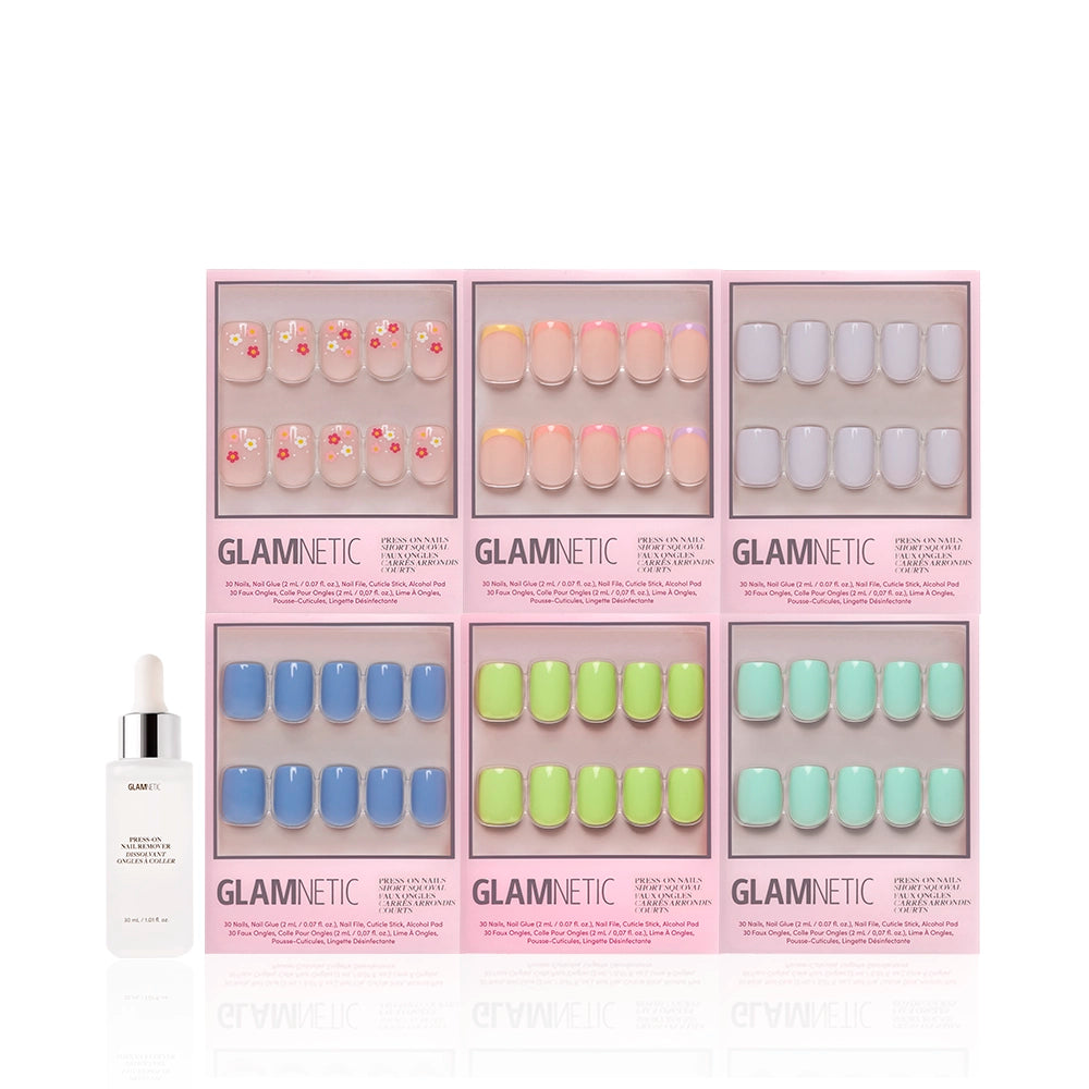 Six boxes of Glamnetic "Squoval Season" press-on nails in assorted pastel shades and patterns, including florals, are displayed in two rows above a white bottle of Glamnetic nail cuticle oil, set against a white background. - Product image