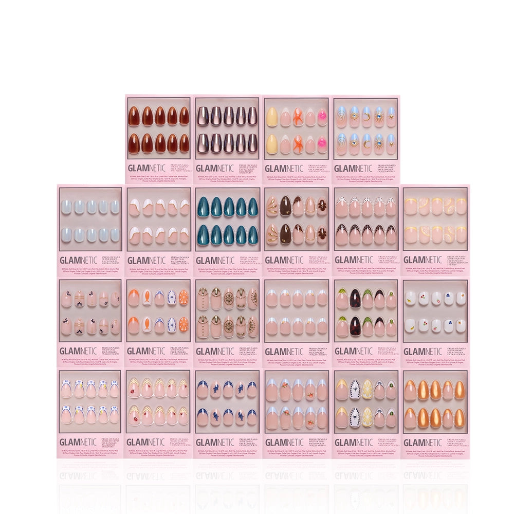 A display of 18 glamnetic Euro Summer Collection salon-quality press-on nail sets in pink boxes, showcasing solid, glitter, and patterned styles—arranged in three rows on a white background. - Product image