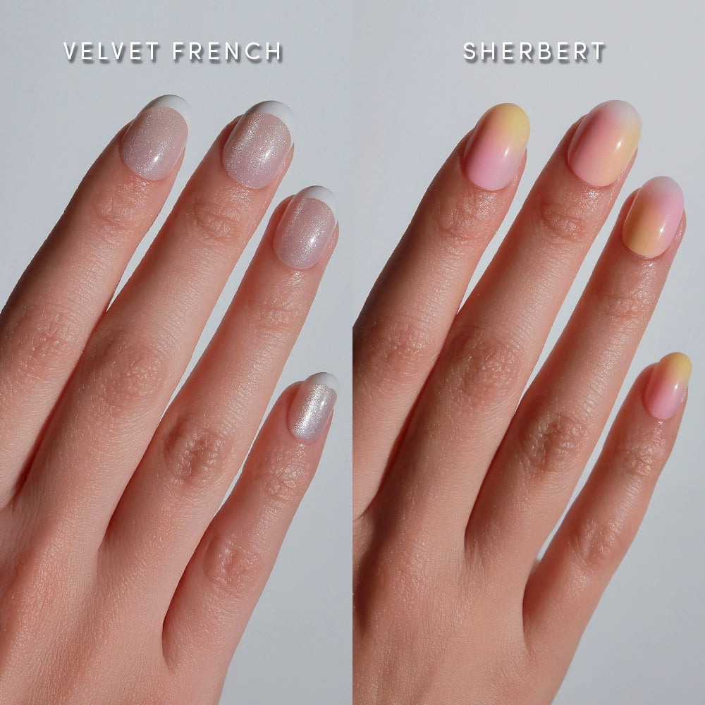 Two manicured hands: the left features a “Velvet French” look with shimmery white tips, while the right sports a “Sherbert” gradient—both using glamnetic’s Making The Rounds press-on nails.