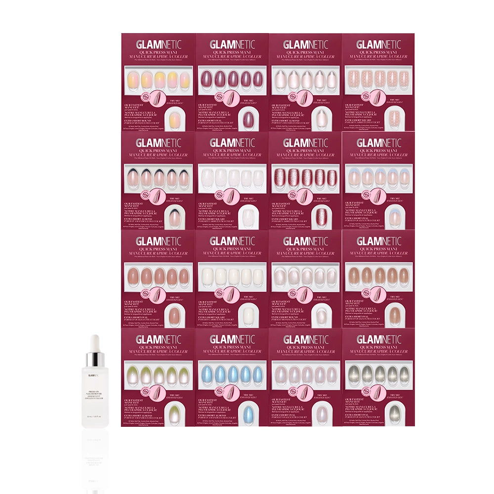 Sixteen glamnetic Quick Press Mani Collection press-on nail sets in assorted colors and designs are neatly arranged in a grid, with a dropper bottle of serum at the bottom left. These no-glue nails are displayed on a clean white background. - Product image