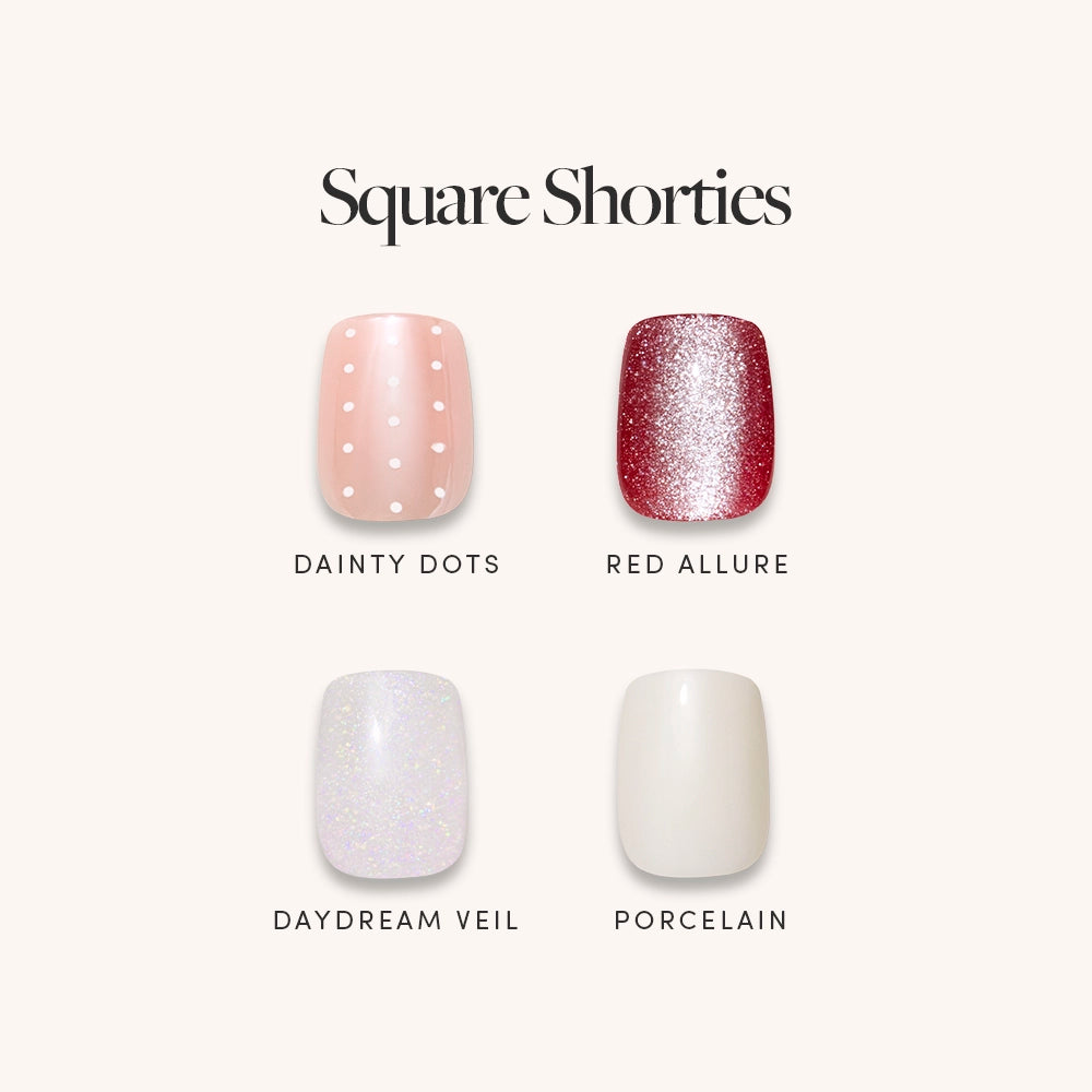 Glamnetic’s Square Shorties press-on nails: Dainty Dots (pink with white polka dots), Red Allure (glittery red), Daydream Veil (sparkly white), and Porcelain (solid off-white).