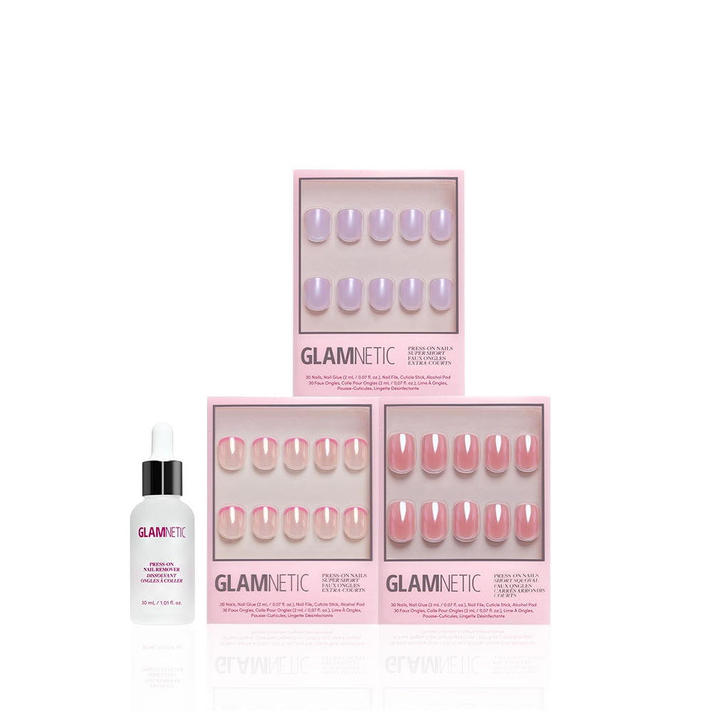 Three boxes of glamnetic’s The Short List press-on nails in short squoval pink and lavender shades are displayed above a bottle of glamnetic Rose Oil nail and cuticle treatment on a white background. - Product image