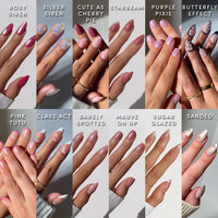 Twelve manicured hands showcase glamnetic’s The Spring Edit Collection—almond-shaped, luminous nails in diverse colors and finishes, each with unique shimmery designs and playful names, all polished to perfection.
