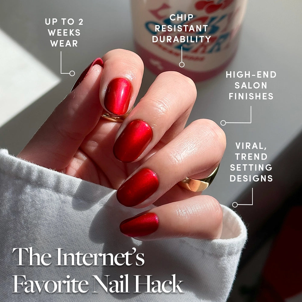 A hand with shiny red, almond-shaped Cherry Glaze press-on nails by glamnetic is shown. Text highlights up to 2 weeks wear, chip-resistant durability, salon-quality finish, and viral designs. Text reads: The Internet’s Favorite Nail Hack. - Product image