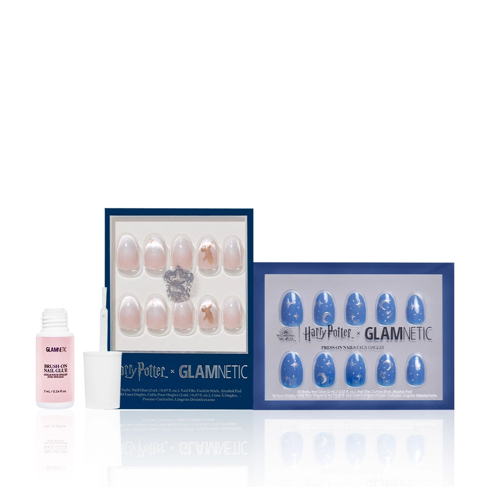 Two boxed sets of glamnetic press-on nails—Luna Lovegood (pink with magical accents) and Team Ravenclaw™ (blue with mystical designs)—are shown, with a bottle of glamnetic nail glue and brush beside them. - Product image