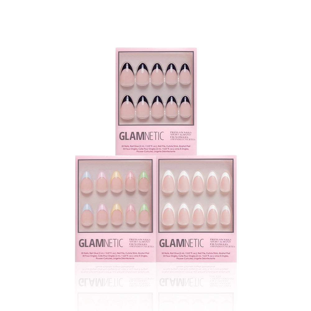 Three pink boxes of the glamnetic Frenchie Bundle press-on nails are displayed. Each box showcases a unique nail design—including elegant French tips and trendy short almond sets—in a variety of pastel and neutral colors, all arranged neatly in two rows against a white background. - Product image