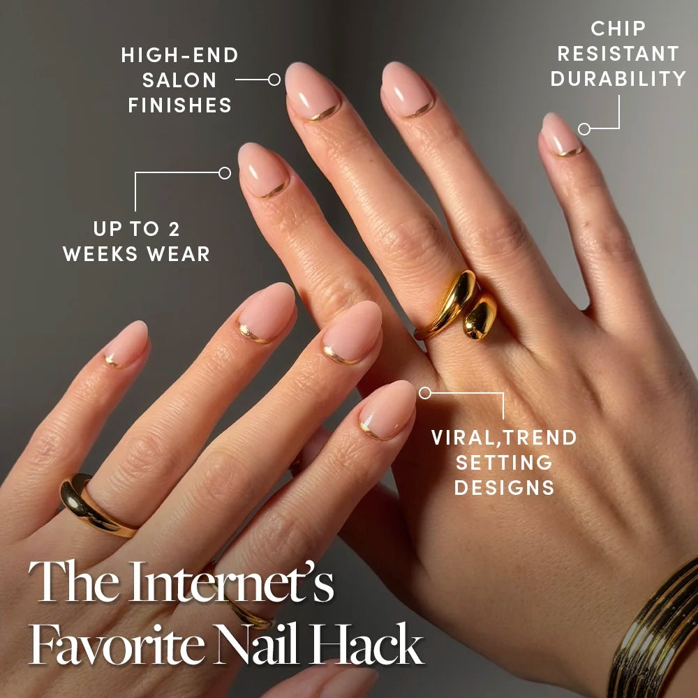 Three hands display glamnetic’s Glam Goals: glossy, nude-pink short oval press-on nails with thin gold French tips. Enjoy high-end salon finishes, chip-resistant durability, up to 2 weeks’ wear, and viral trend-setting designs. - Product image