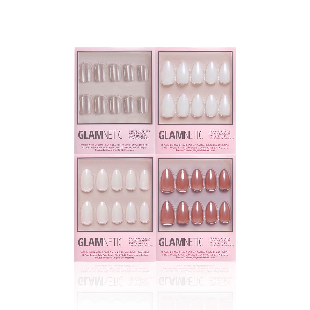 Four boxes of glamnetic Glaze It press-on nails in nude and pink tones are arranged in a square on a white background. Each short almond set shows ten UV gel-coated nails through a clear window. - Product image