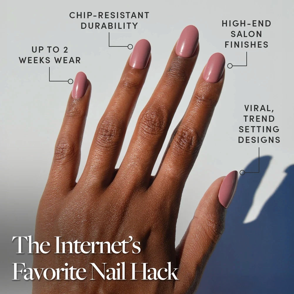 A hand with glossy glamnetic Mauve Mood press-ons is shown, featuring up to 2 weeks wear, chip-resistant durability, salon-quality finish, and viral designs. Text at bottom: The Internet’s Favorite Nail Hack. - Product image