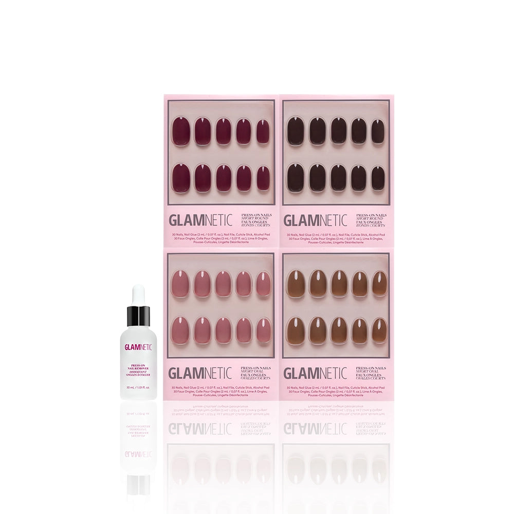 Four sets of glamnetic Fauna & Flora press-on nails in maroon, pink, and brown hues, displayed in pink packaging, are arranged alongside a small dropper bottle labeled glamnetic on a white background. These vegan nails feature chic short oval shapes for an effortlessly elegant look. - Product image